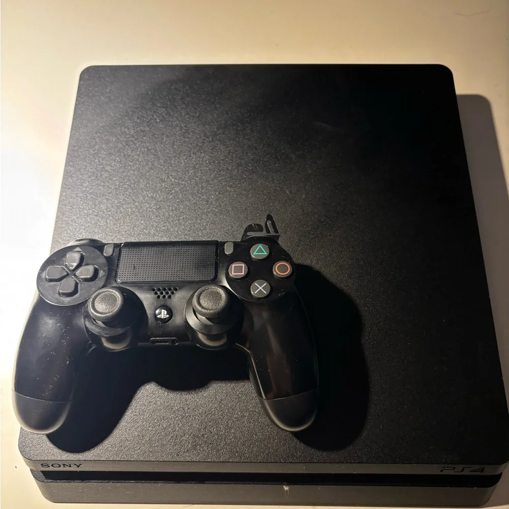 Sony Black Gaming Console with Controller